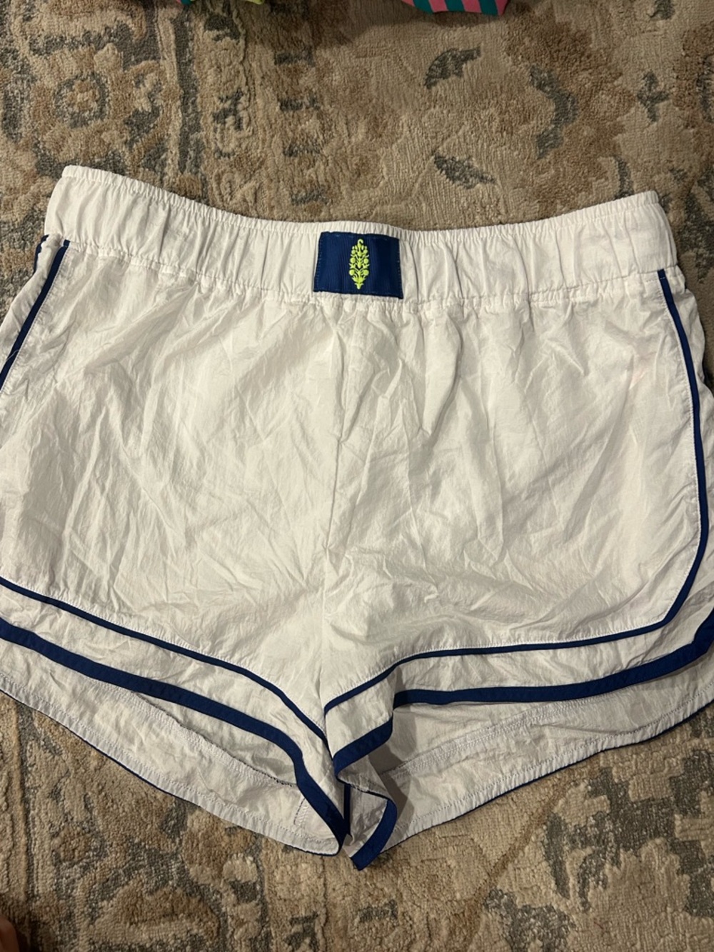 White Women’s Athletic Shorts with Navy Trim